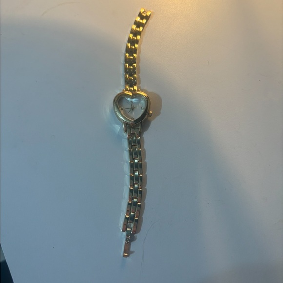 Urban Outfitters Accessories - UO gold heart shaped watch